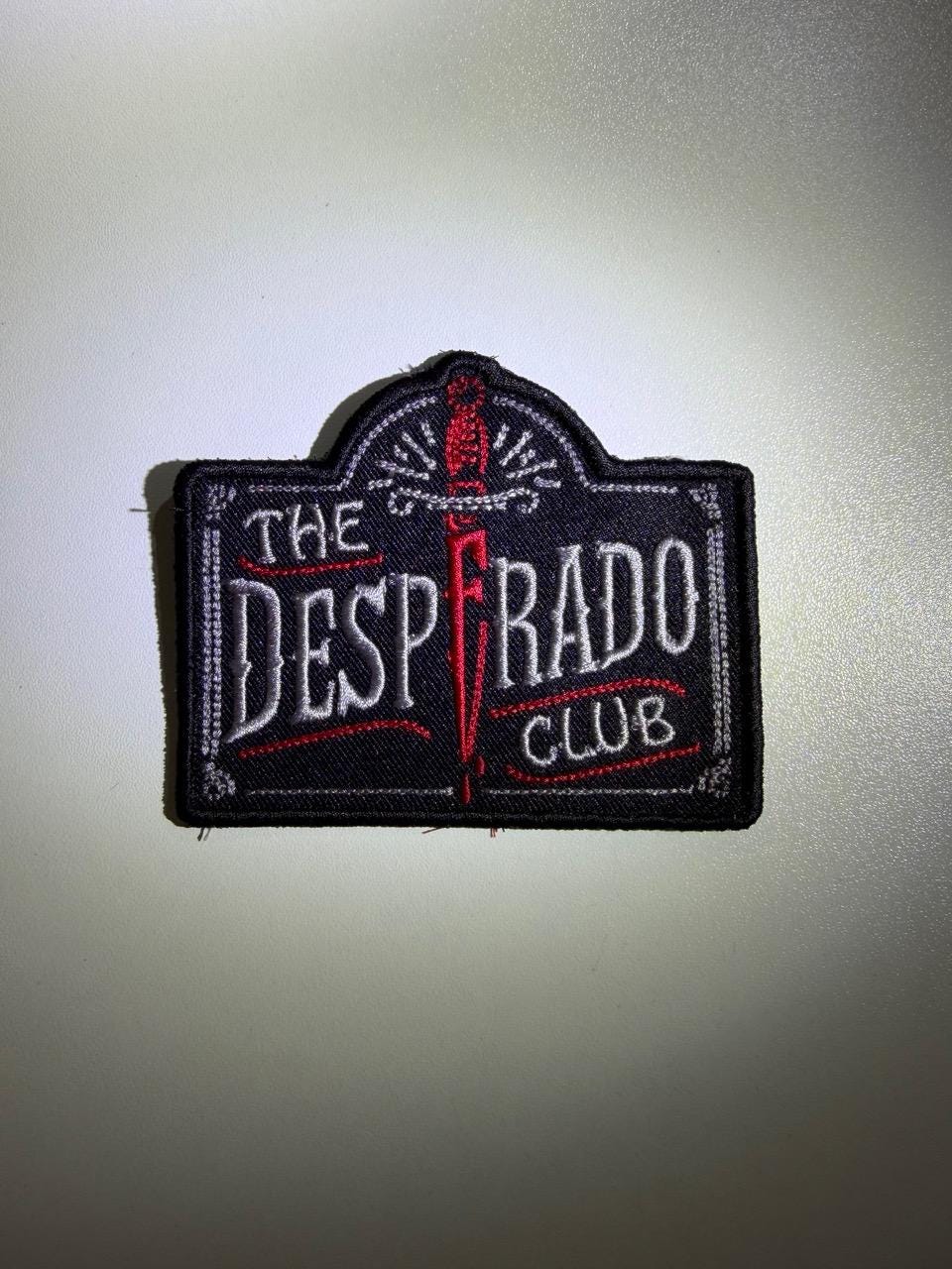 Embroidered Desperado Club Patch, Dungeon Crawler Carl DCC, Sew-On or Iron-On Backing
